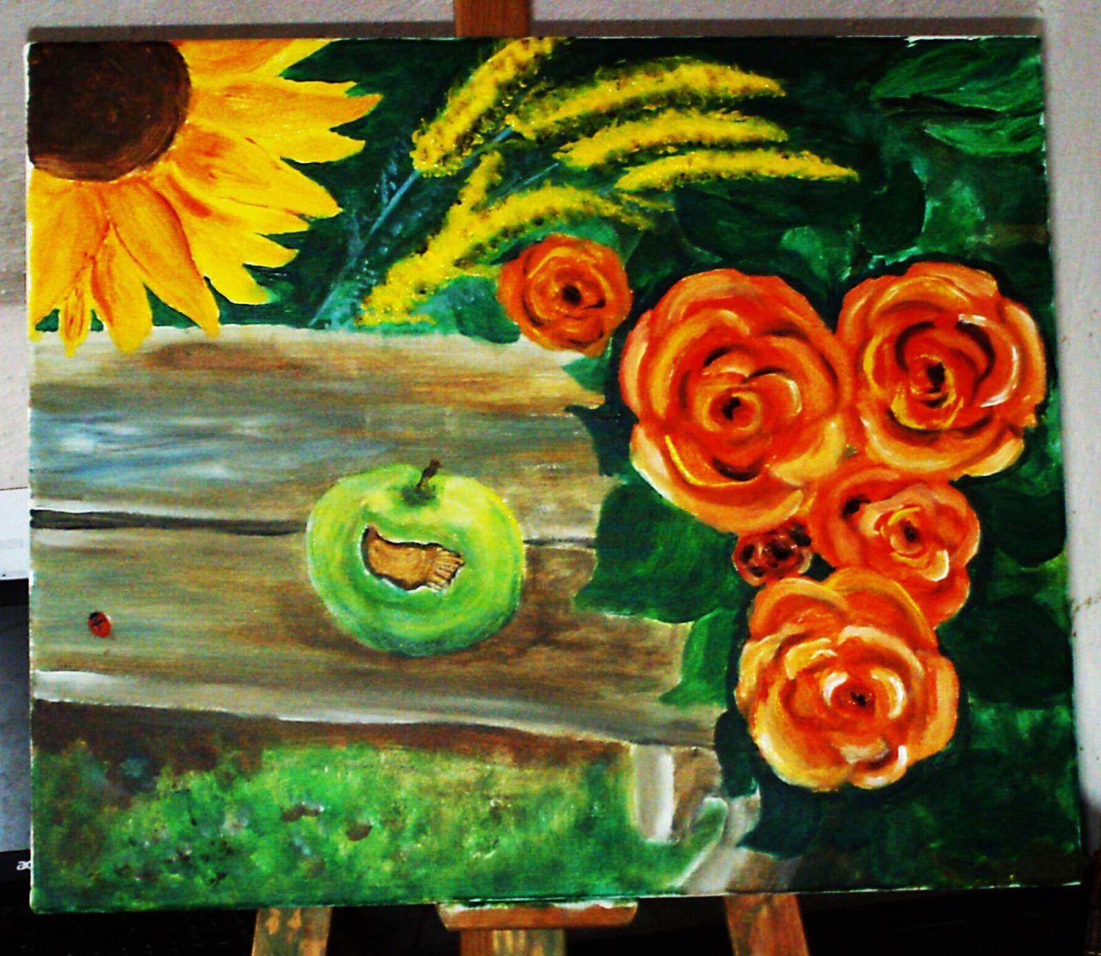 Garden bench with roses and apple. 