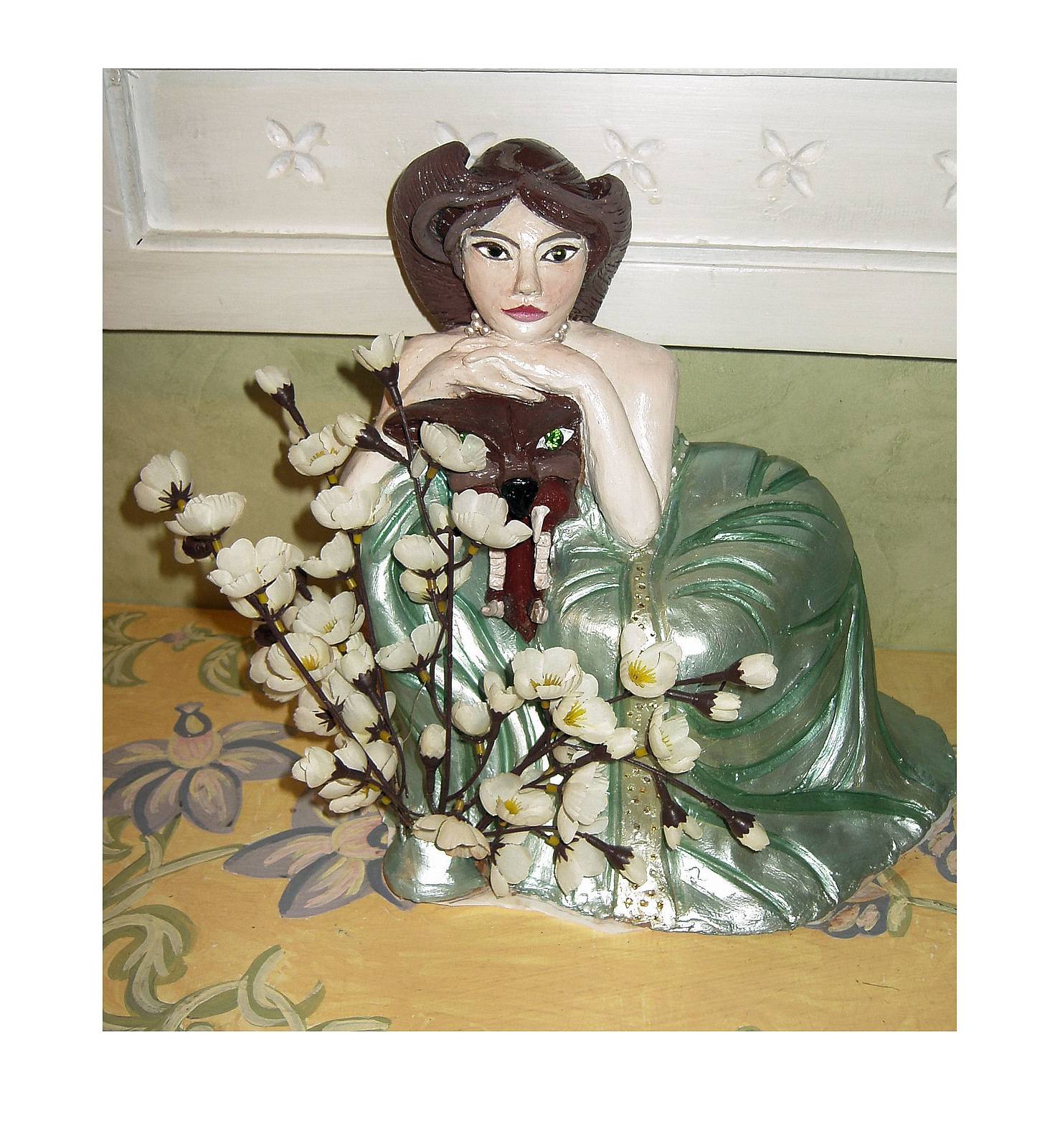 Statuette inspired by the picture of A. emerald. Mucha .  Ardegem
