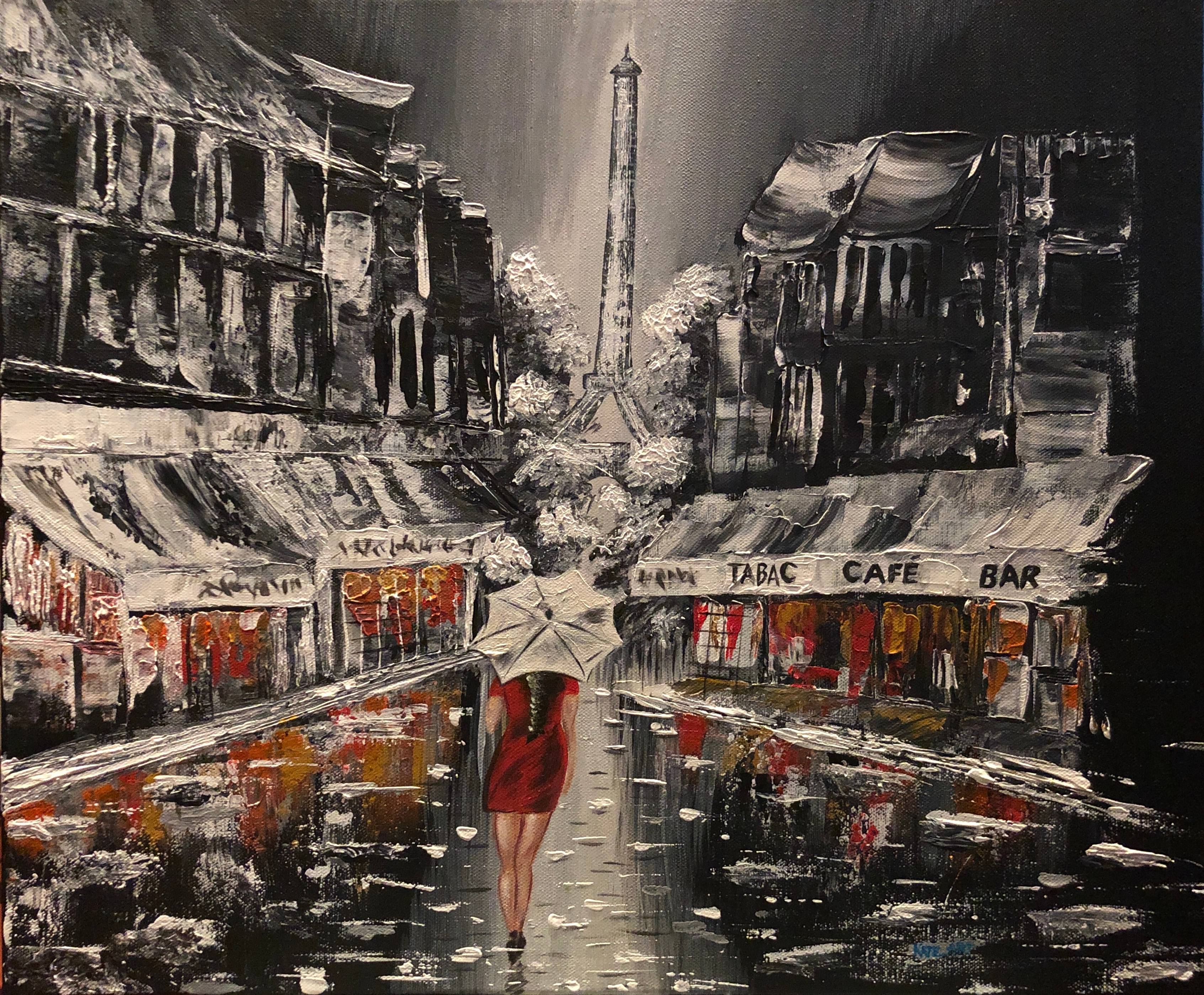 Lady in the rain in the street of Paris. 