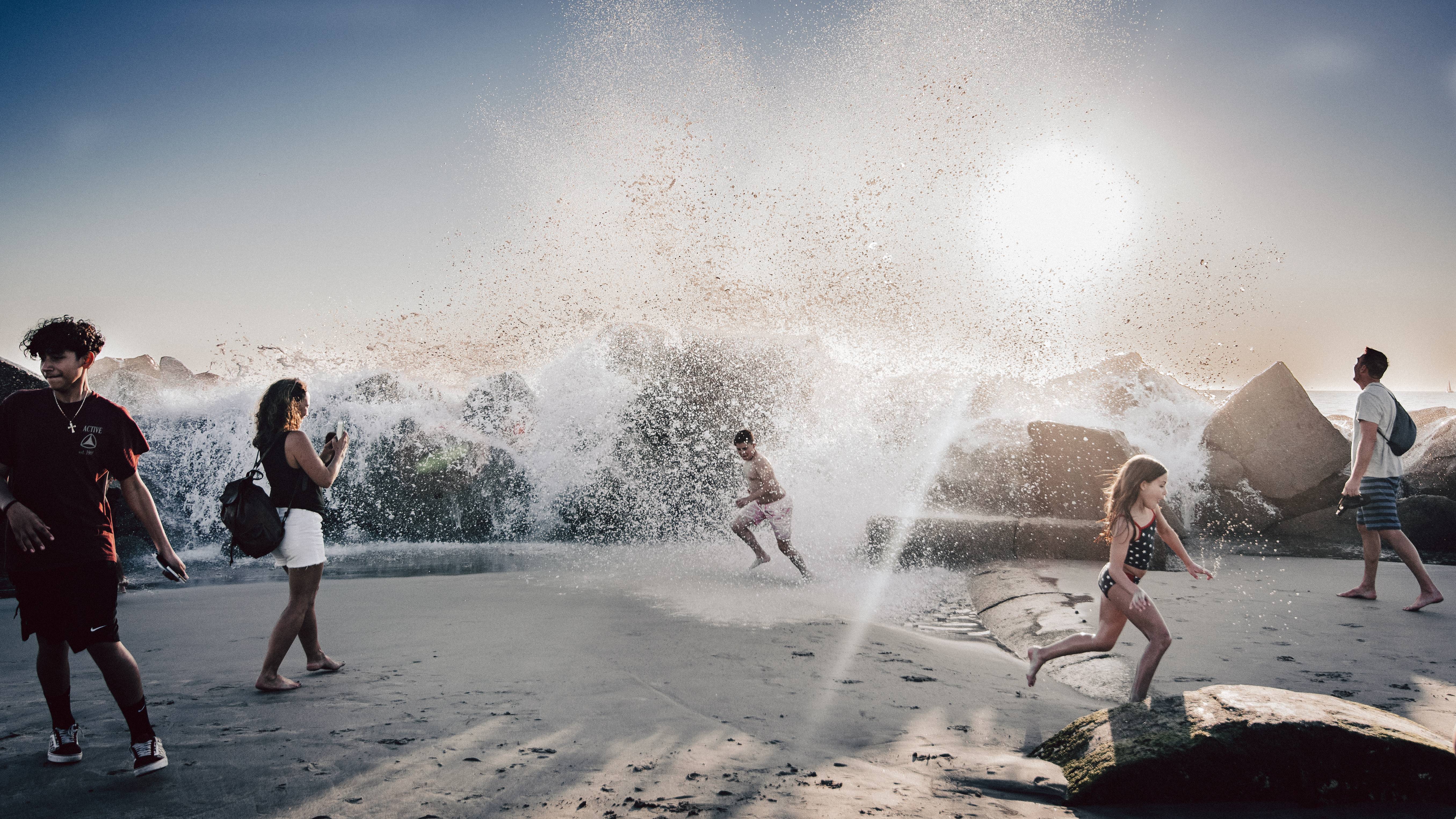 Playing with Waves on Breakwater. Mahokai