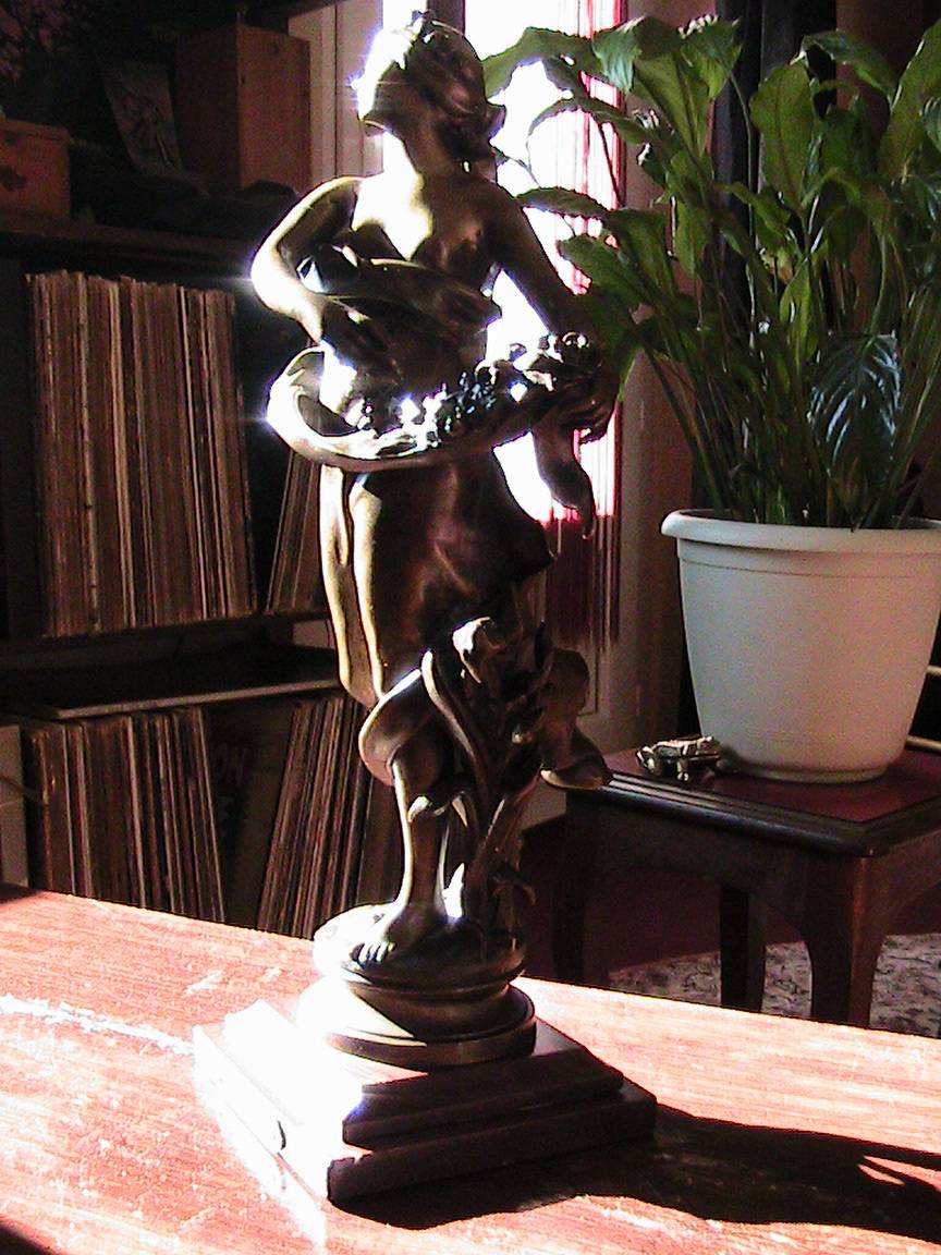 Bronze sculpture on marble base. Marie Wowert