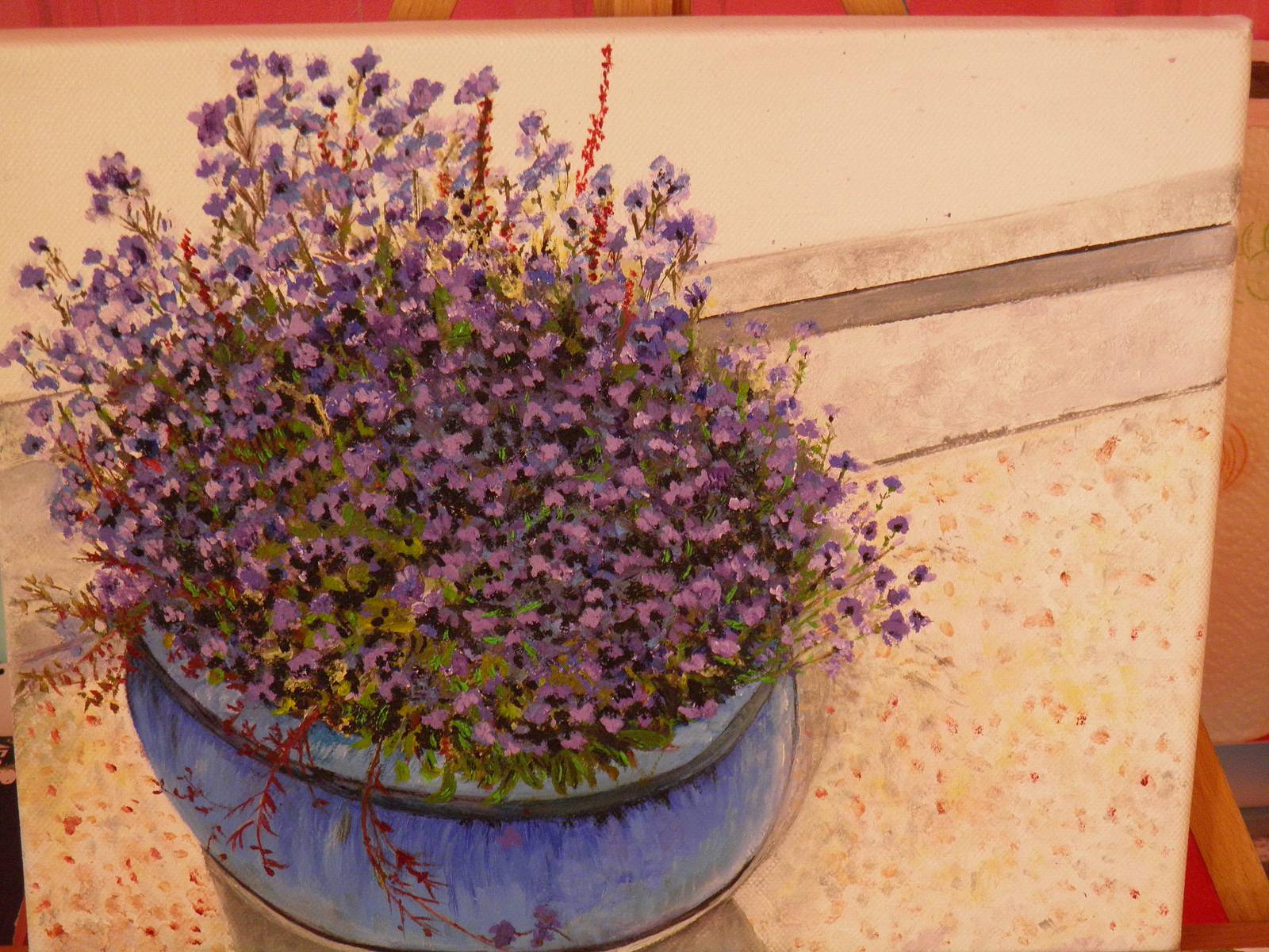 Petites fleurs dans pot bleu ètè 2011. 