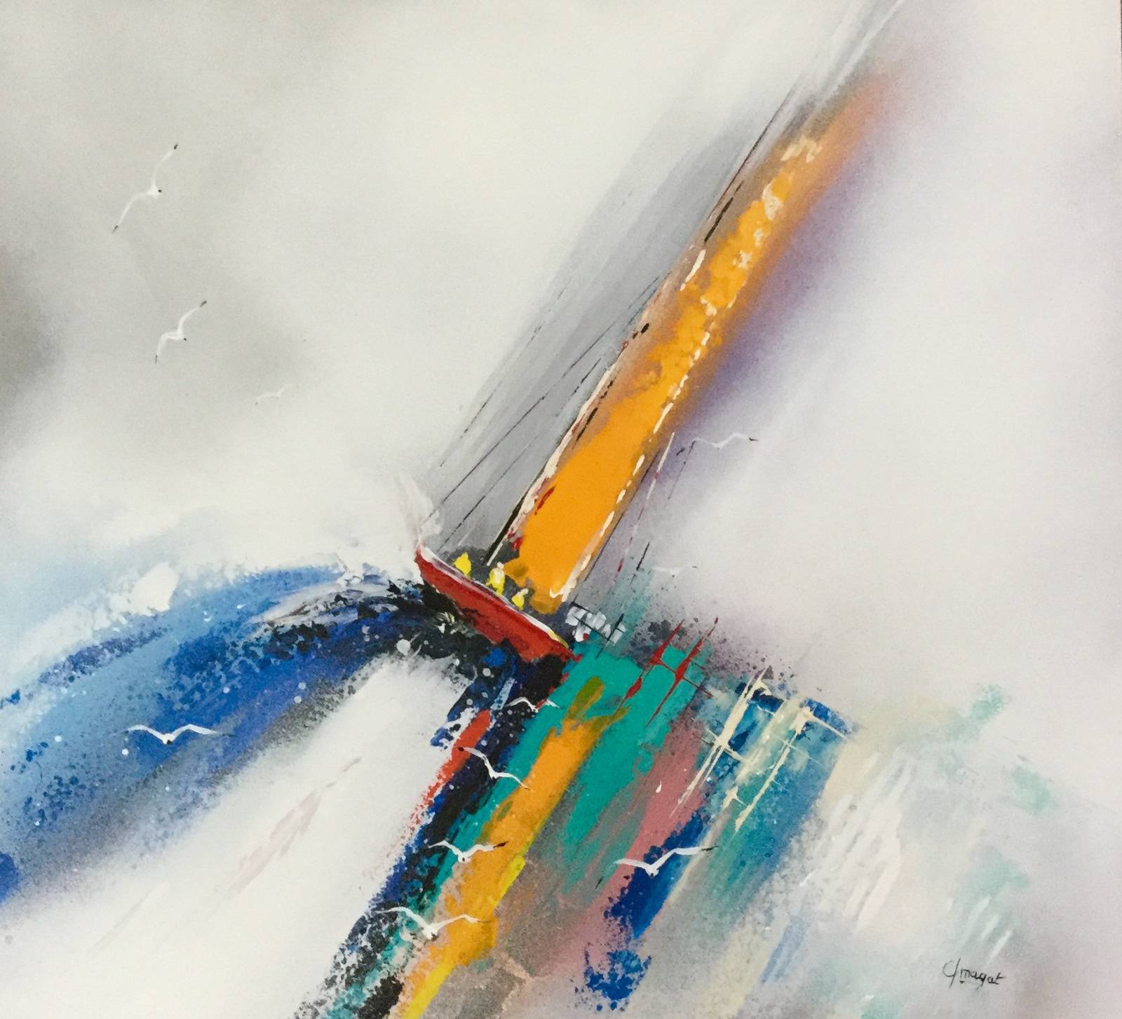 Voilier qui danse sur les vagues bleus et turquoises. 