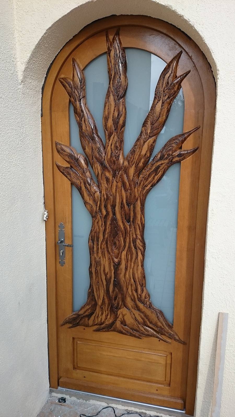 Porte d'entée cintrée, vitrée en chêne. Manuel Desson